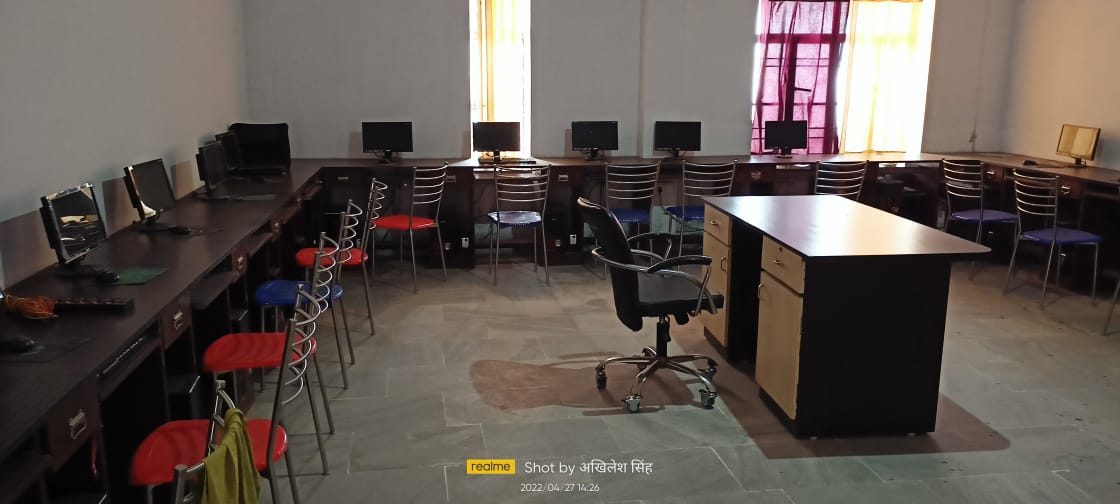 Computer lab at Parmarth Institute, Rohtas, with rows of desktop computers
